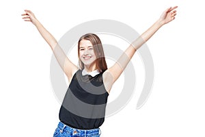Happy young teenager girl with hands up isolated