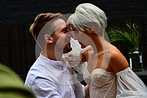 Happy young wedding couple kissing and hugging