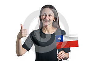 Happy young white woman holding flag of Chile and shows the class by hand isolated on a white background