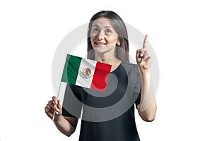 Happy young white woman holding flag of Mexico and points thumbs up isolated on a white background