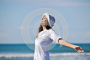 Happy young woman on beach