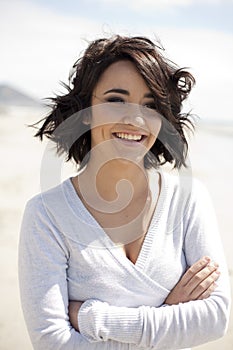 Happy young woman at beach