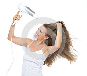 Happy young woman blow-dry