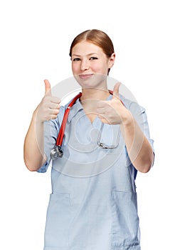 Happy young woman in blue surgical coat with red stethoscope