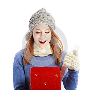 Happy young woman with Christmas present box