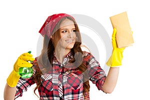 Happy young woman cleaning windows isolated over white vackground