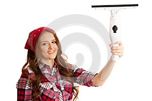 Happy young woman cleaning windows isolated over white vackground