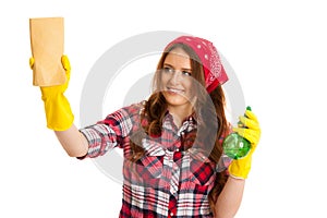 Happy young woman cleaning windows isolated over white vackground