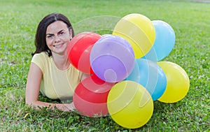 Happy Young Woman With Colorful Balloons