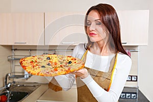 Happy Young Woman Cooking Pizza