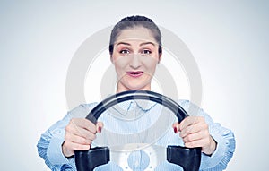 Happy young woman driver car with steering wheel, auto concept