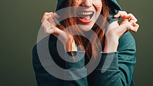 Happy young woman fun elation toothy smile photo