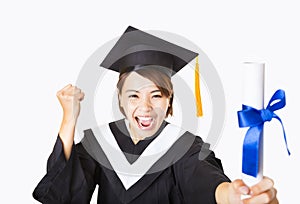 happy young woman graduating holding diploma