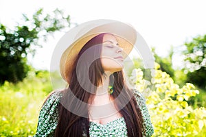 Happy young woman with hat
