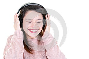 Happy young woman with headphones on white background