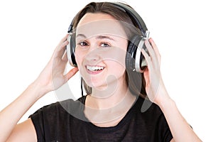 Happy young woman with headphones on white background