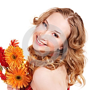 Happy young woman holding flowers.