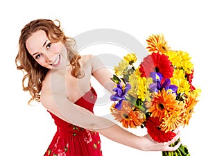 Happy young woman holding flowers.