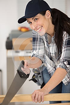 Happy young woman during home improvement