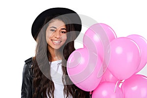 happy young woman in leather jacket with balloons