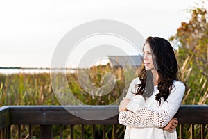 Happy young woman on nature walk