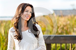 Happy young woman on nature walk