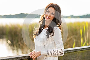 Happy young woman on nature walk