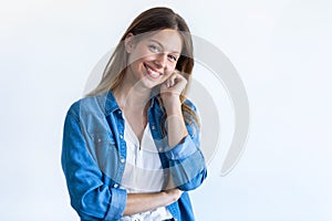 Happy young woman with perfect smile looking at camera. Isolated on white background