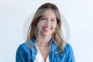 Happy young woman with perfect smile looking at camera. Isolated on white background