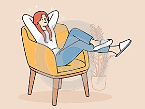 Happy young woman relax in chair