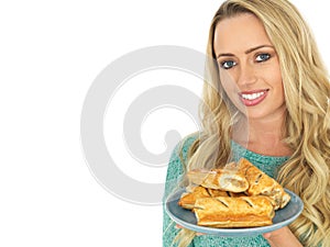 Happy Young Woman With Sausage Rolls