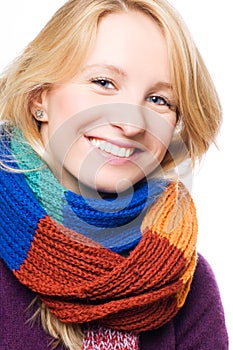 Happy young woman in a scarf