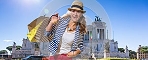 Happy young woman shopper at Piazza Venezia in Rome, Italy