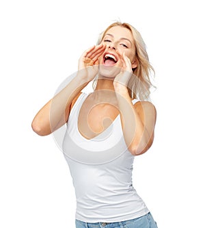 Happy young woman shouting or calling someone