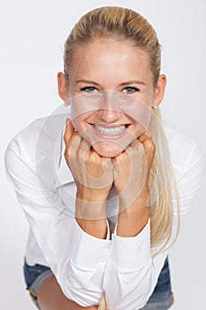 Happy young woman smiling for camera