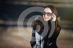 Happy young woman with sunglasses