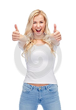 Happy young woman or teenage girl in white t-shirt