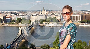 Happy young woman toothy smile at Budapest panorama, Hungary