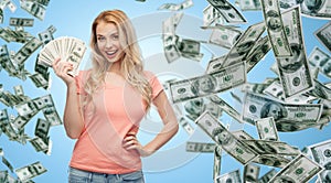 Happy young woman with usa dollar cash money