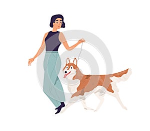 Happy young woman walking with dog. Pet owner leading her Akita-Inu doggy on leash. Female character and purebred