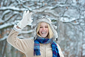 Happy young woman in winter.