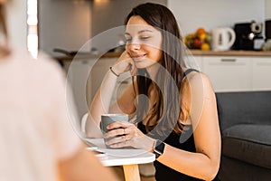 Happy young woman working from home with child. Home office. Quarantine