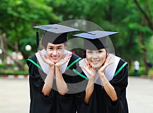 Happy young women graduate students