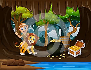 Happy zookeeper and lion in the treasure cave