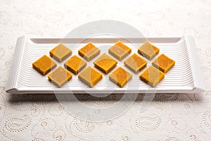 Hapus Amba Vadi / Burfi or Alphonso mango dried Cake or Bar, selective focus photo