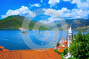 Harbor and ancient buildings in sunny day at Boka Kotor bay Boka Kotorska, Montenegro.