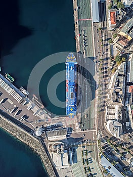 Harbor area and see view from Corsica, big ship side docking station in line for car lines