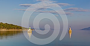 Harbor entrance lights at sunset