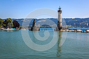 Harbor entrance in Lindau on Lake Constance with the landmark lion and lighthouse, Bavaria, Germany