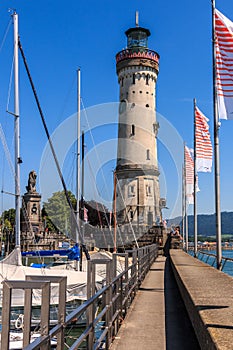 Harbor entrance in Lindau on Lake Constance with the landmark lion and lighthouse, Bavaria, Germany